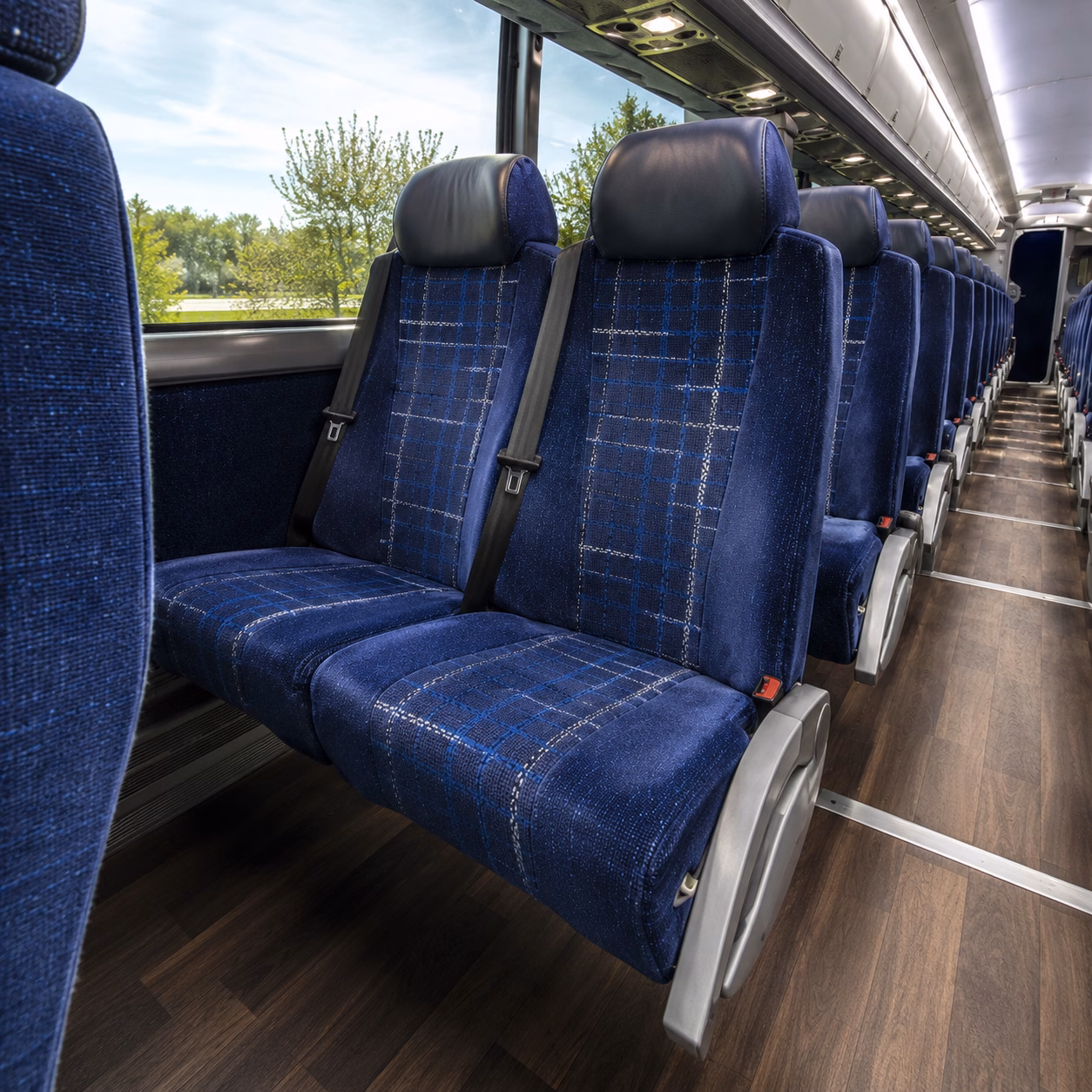how seasonality and peak times affect charter bus rates in livonia michigan